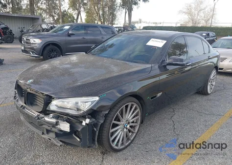 2015 BMW 750Li z USA, uszkodzony, nr VIN WBAYE8C55FD782112